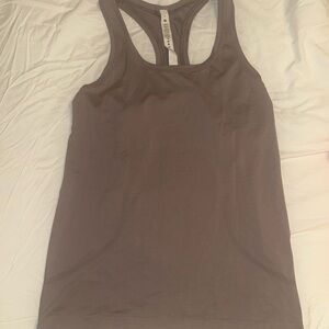 Mauve colored size 8 Lululemon tank top.